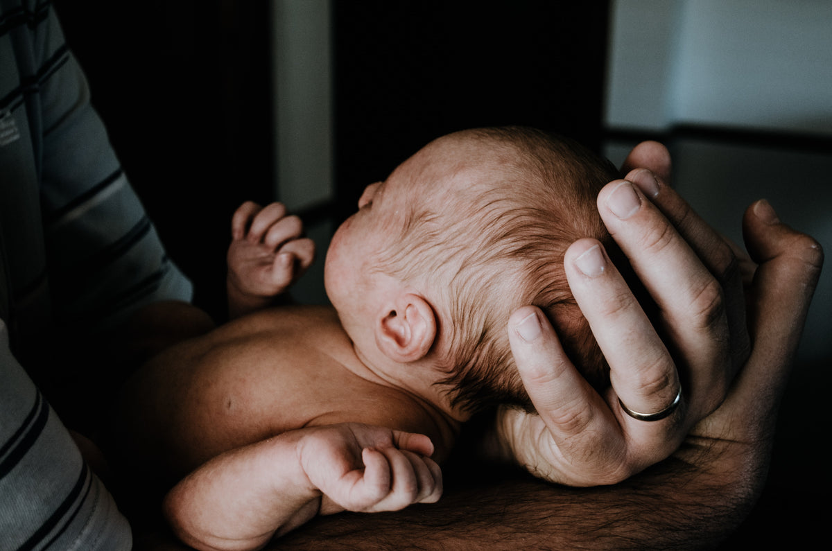 new father and baby - Photo by Kelly Sikkema